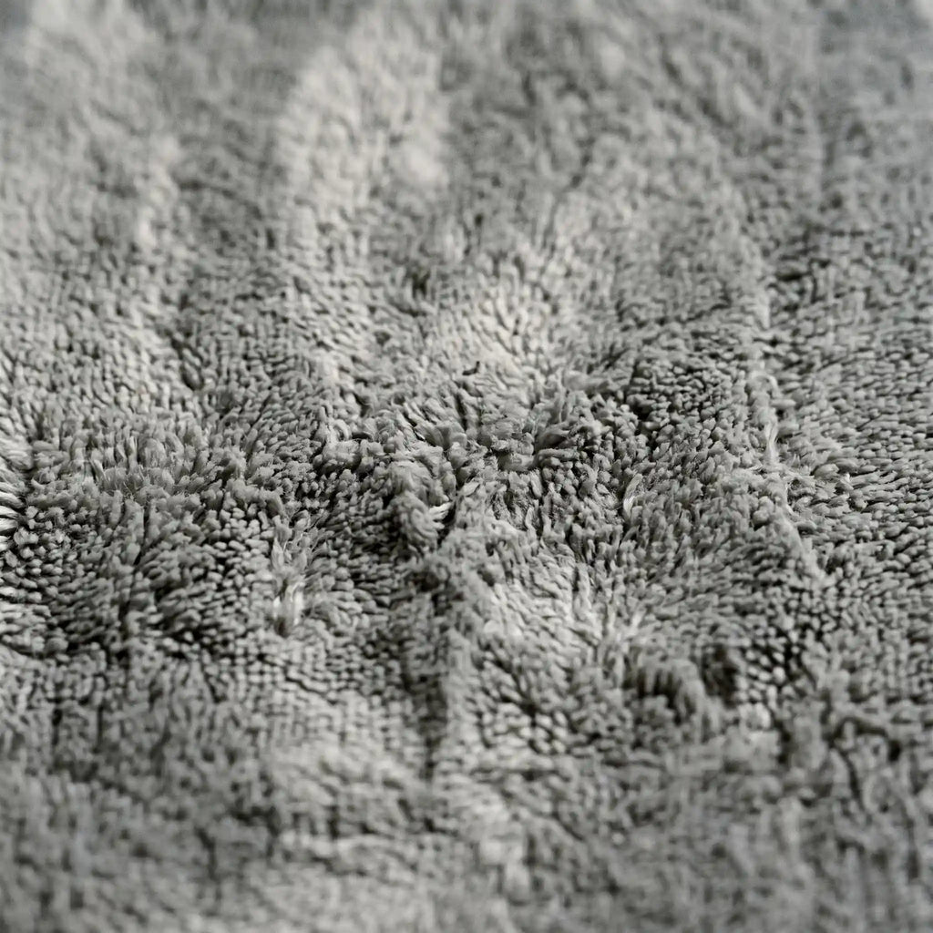 Tapis de bain absorbant incurvé
