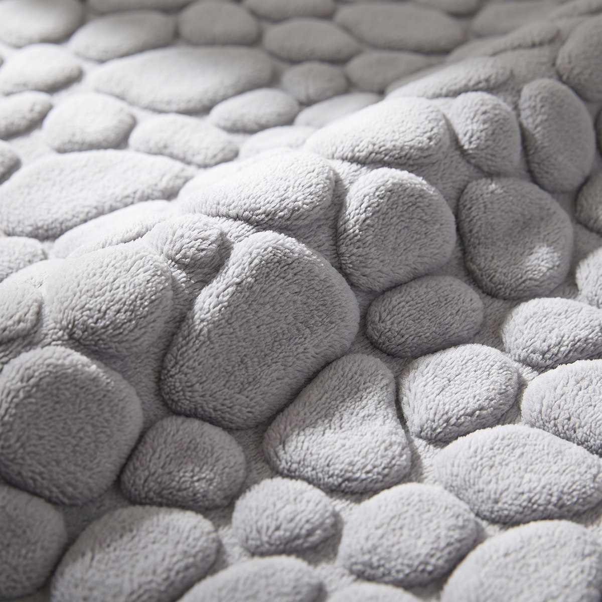 Tapis de bain d'angle effet galet