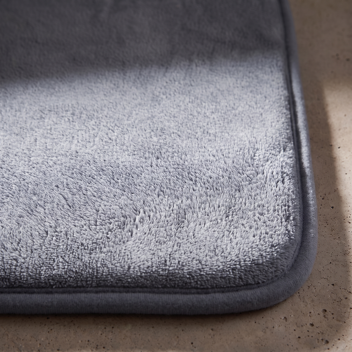 Tapis de bain d'angle absorbant
